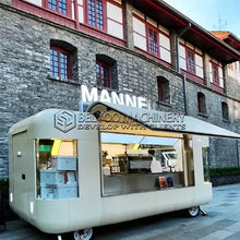 Load image into Gallery viewer, Belyoo Fast Food Vending Cart Burger Taco Street Food Trailer set outside a building, showcasing its modern design.
